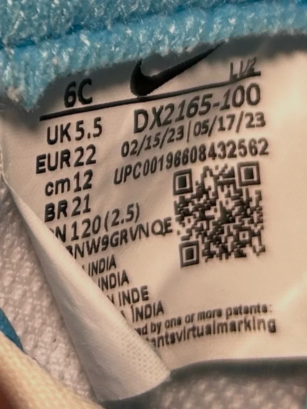 Nike Kids Blue and White Low-Top Sneakers with Navy Swoosh